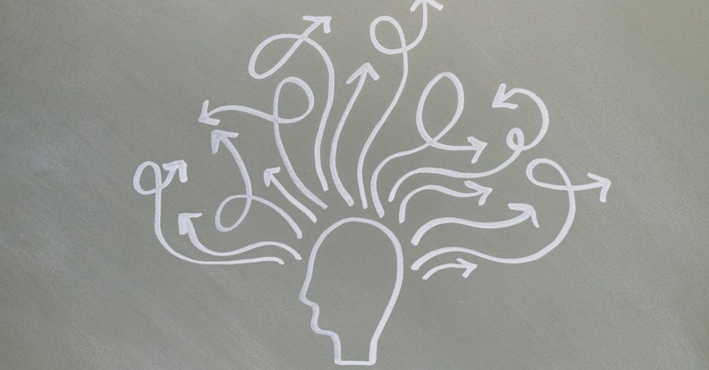 Conceptual chalk drawing illustrating mental health challenges with arrows representing thoughts.